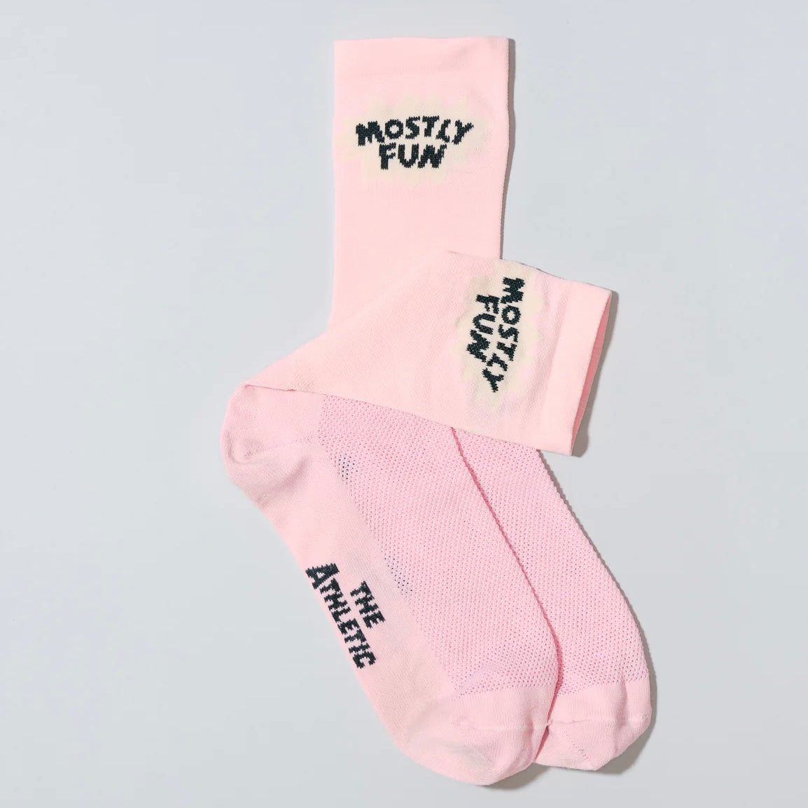 THE ATHLETIC COMMUNITY Mostly Fun Pink Cycling Socks