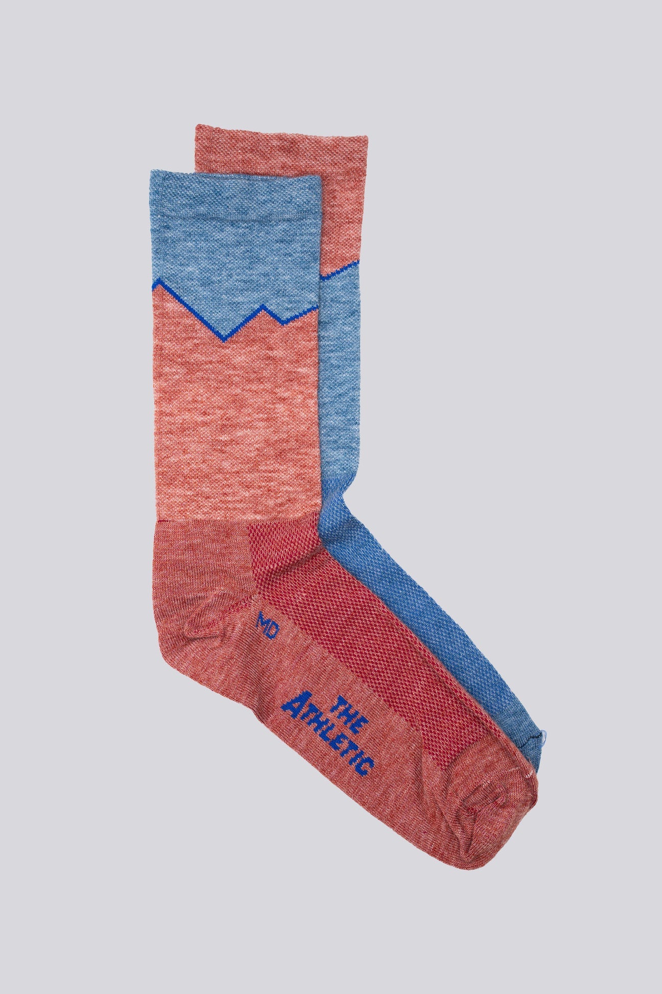 THE ATHLETIC COMMUNITY Elevation Blue And Pink Mismatched Cycling Socks