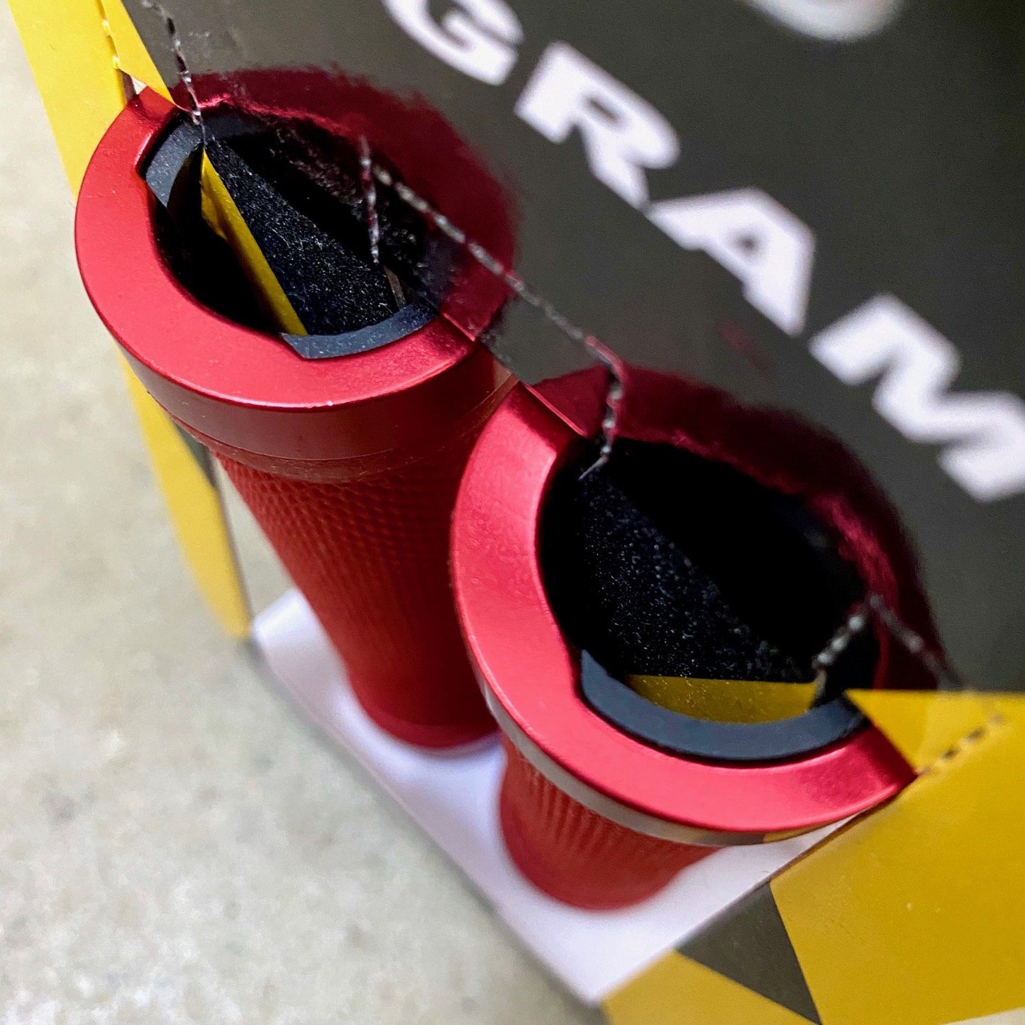 Trigram red handlebar grips